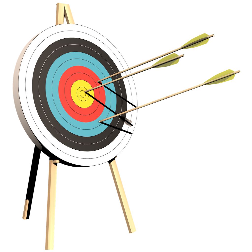 Archery target with three arrows in it